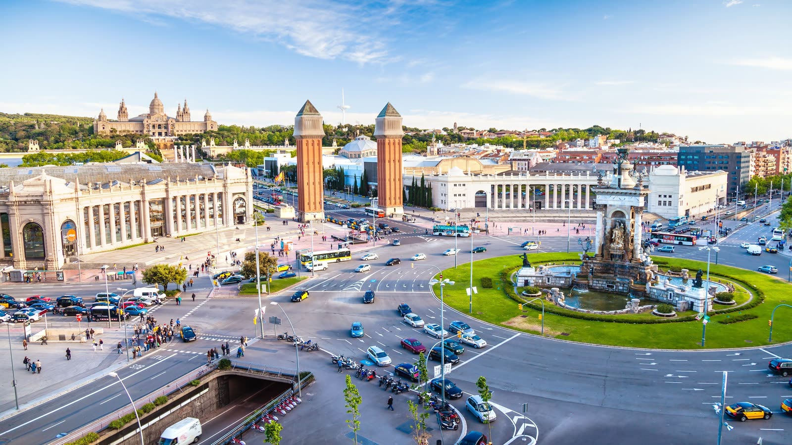 Travel maps and a camera on a wooden table
